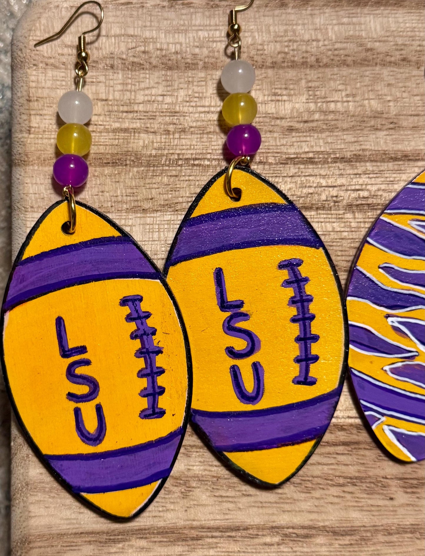 LSU-Themed Purple And Gold Football Shaped Wooden Earrings