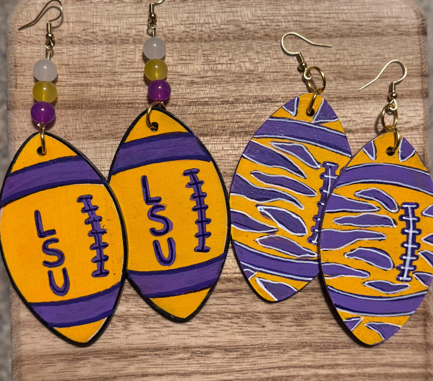LSU-Themed Purple And Gold Football Shaped Wooden Earrings