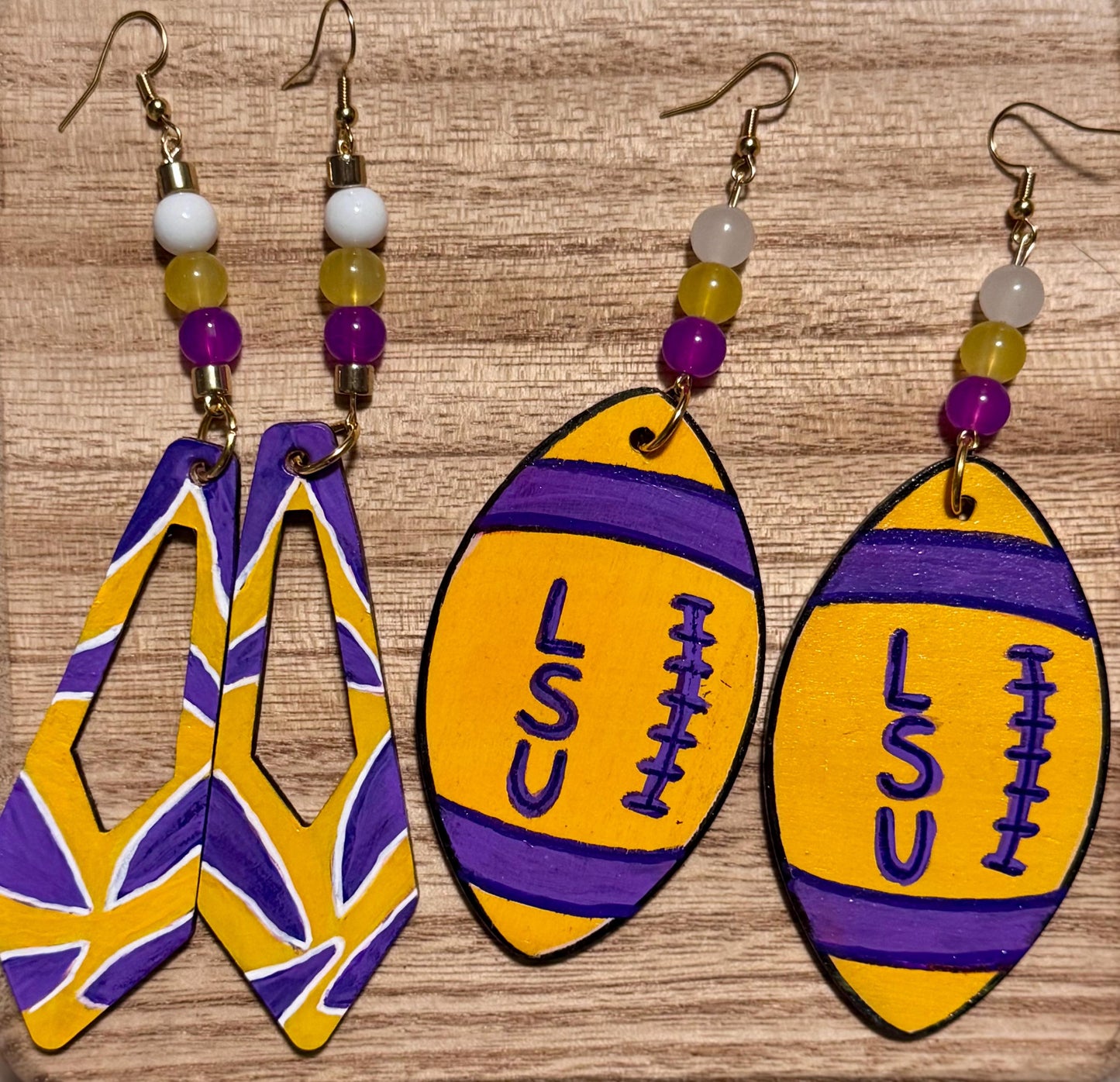LSU-Themed Purple And Gold Football Shaped Wooden Earrings