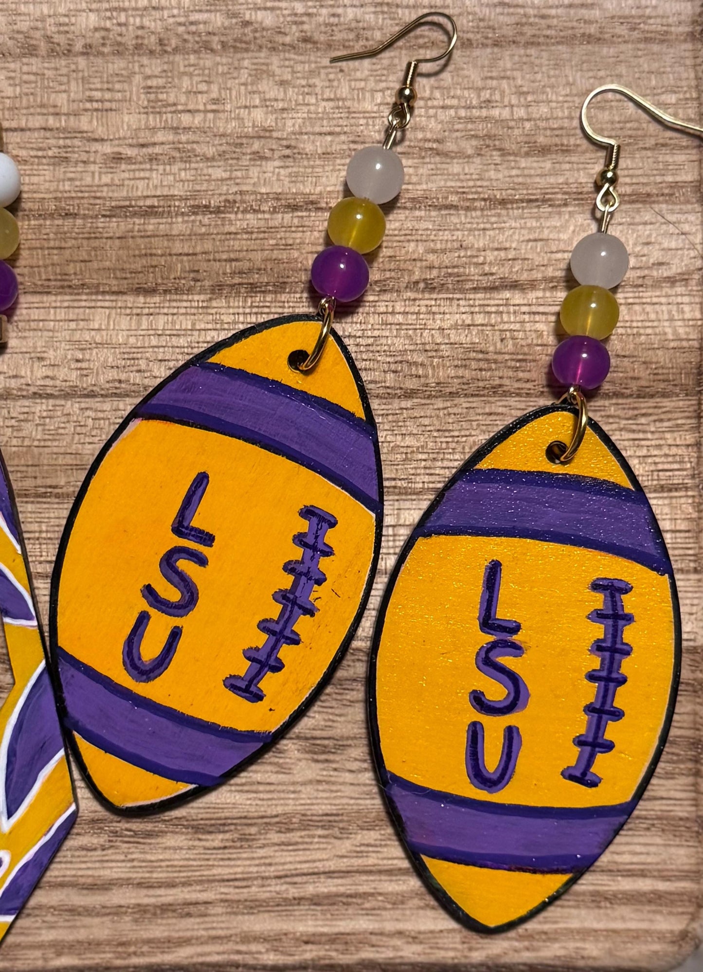 LSU-Themed Purple And Gold Football Shaped Wooden Earrings