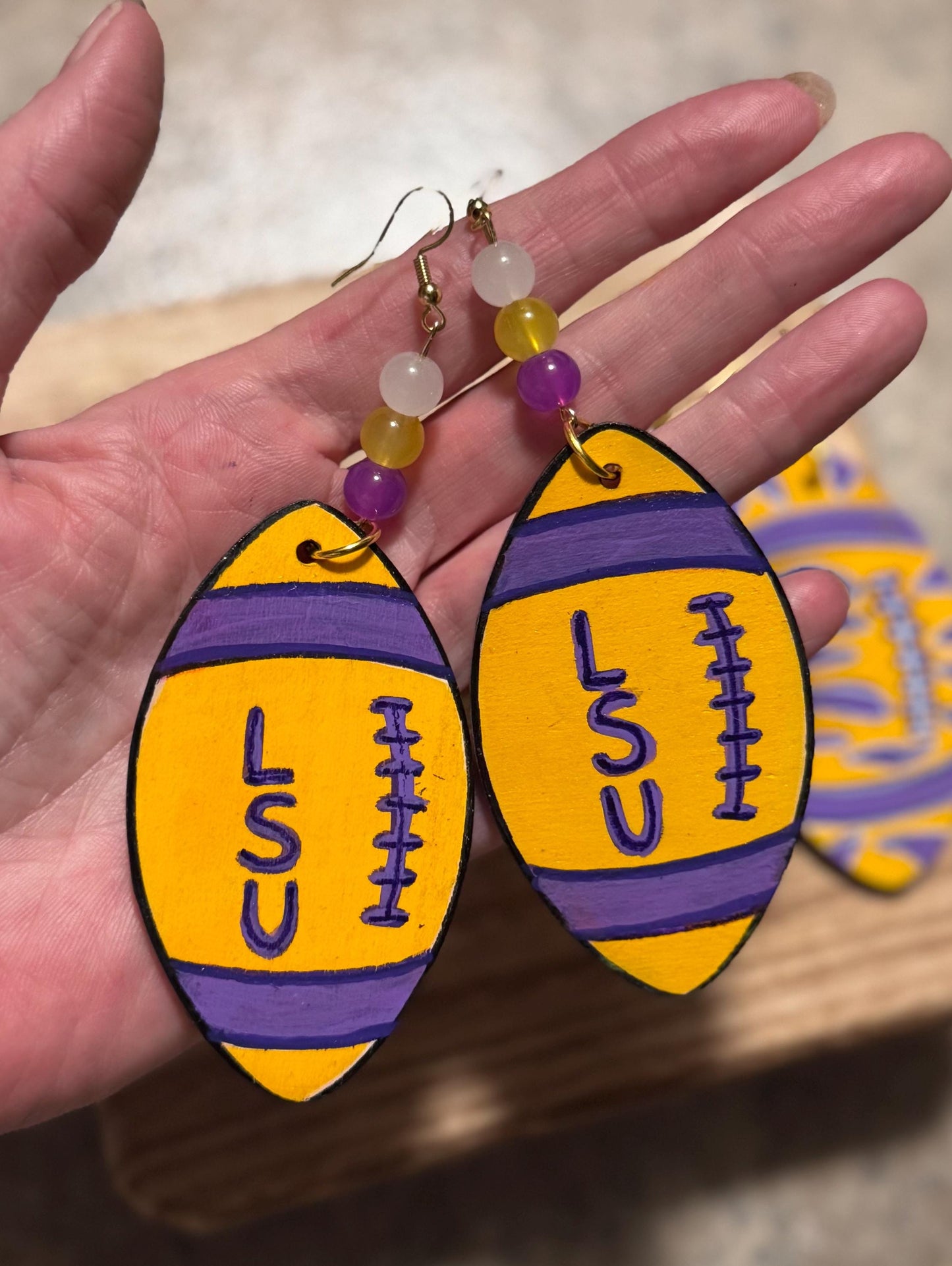 LSU-Themed Purple And Gold Football Shaped Wooden Earrings